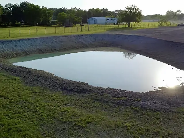 Completed custom pond construction and excavation project in Glasford, Illinois